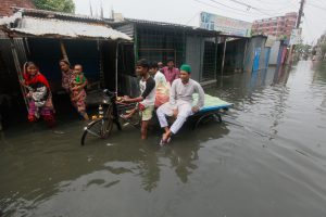 A heavy monsoon rain paralyzed the Dhaka-Narayanganj-Demra (DND) dam areas. Thousands of people living inside the Dhaka-Narayanganj-Demra (DND) dam