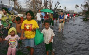 residents travelling through flood