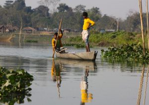 <p>Fishermen set out in the early morning in Maguri Wetlands near the Brahmaputra River in upper Assam (Images by Brian Orland).</p>
