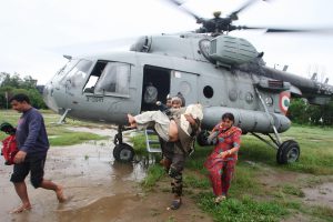 <p>An Indian Air Force helicopter evacuates victims of the 2014 floods in Jammu and Kashmir [Image by: Pacific Press Media Production Corp./Alamy]</p>
