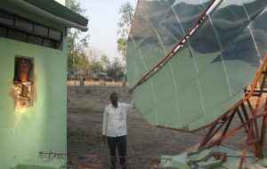 <p>Solar water-heating mirror installed in a village in Maharashtra. (Image by World Resources Institute)</p>