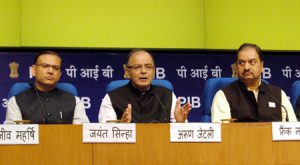 <p>India&#8217;s Finance Minister Arun Jaitley (Centre) briefs the media after presenting the 2015 budget in Parliament on Saturday (Image by Press Information Bureau, Government of India)</p>