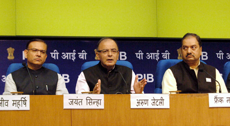 <p>India&#8217;s Finance Minister Arun Jaitley (Centre) briefs the media after presenting the 2015 budget in Parliament on Saturday (Image by Press Information Bureau, Government of India)</p>