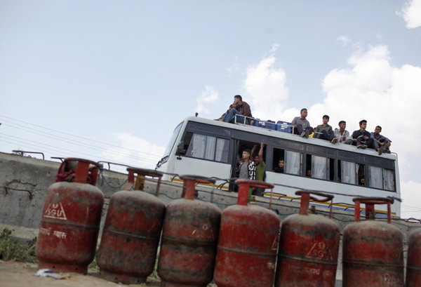 <p>Crowded bus in Kathmandu. Since the fuel crisis the roads have become almost car-free (Photo: Twitter)</p>