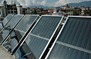 <p>Solar water heating panels in Boudha, Kathmandu. (Image by Wonderlane)</p>