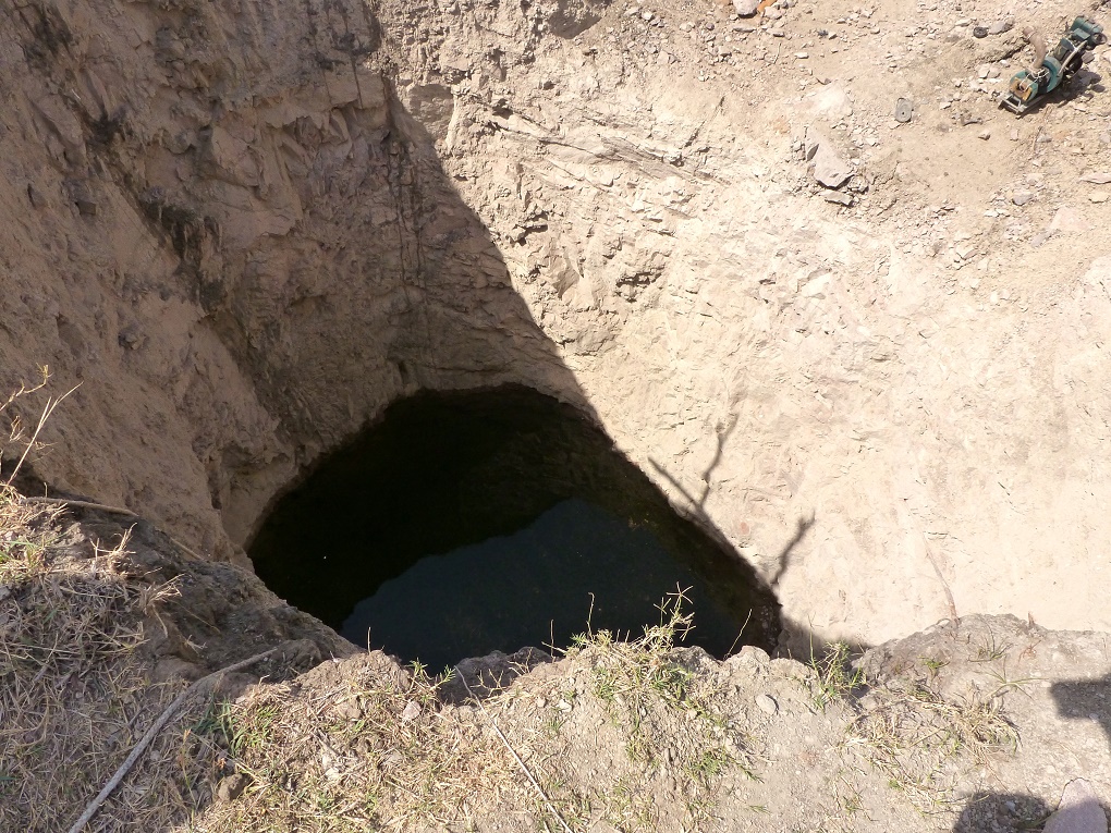 Water rises in a well in the Datia district of Madhya Pradesh after the area was recharged by building tiny check dams [image by Soumya Sarkar]