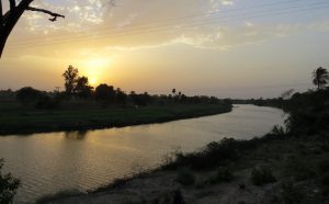 <p>The Shipra flows into Ujjain at sunset</p>