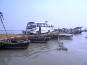 <p>Close to 60 boats are used to build a pontoon bridge as two permanent bridges collapsed because of floods [image by Alok Gupta]</p>