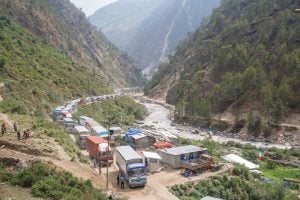 <p>Trucks queing up in Timure, three kilometres from Nepal Tibet border to get clearance from Nepal&#8217;s security force [image by Nabin Baral]</p>
