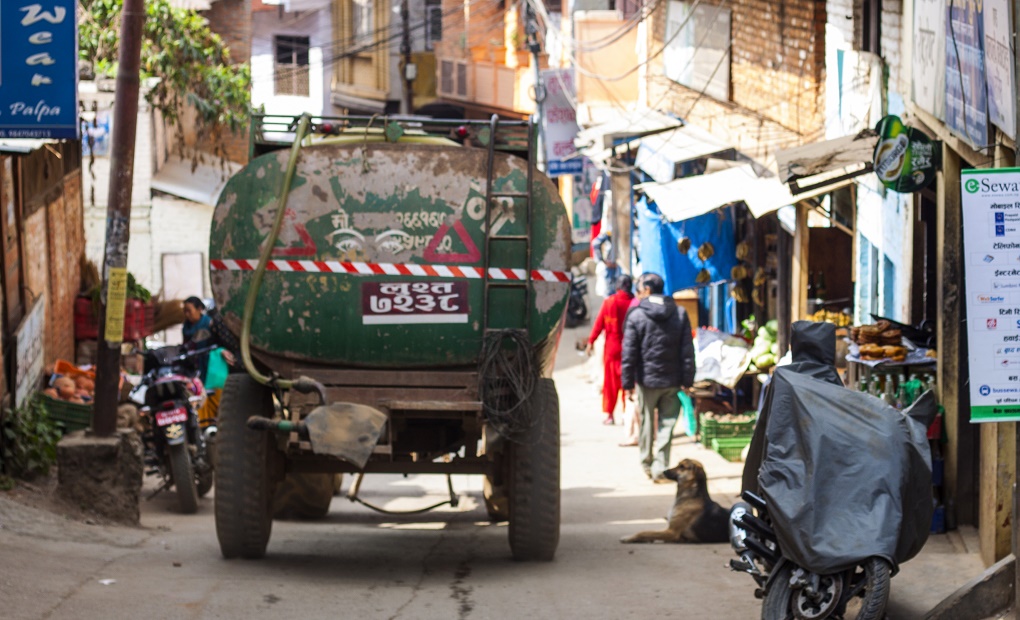 <p>Private water tanker operators supply water to households to fill the gap left by the public distribution system [image by: Abhaya Raj Joshi]</p>