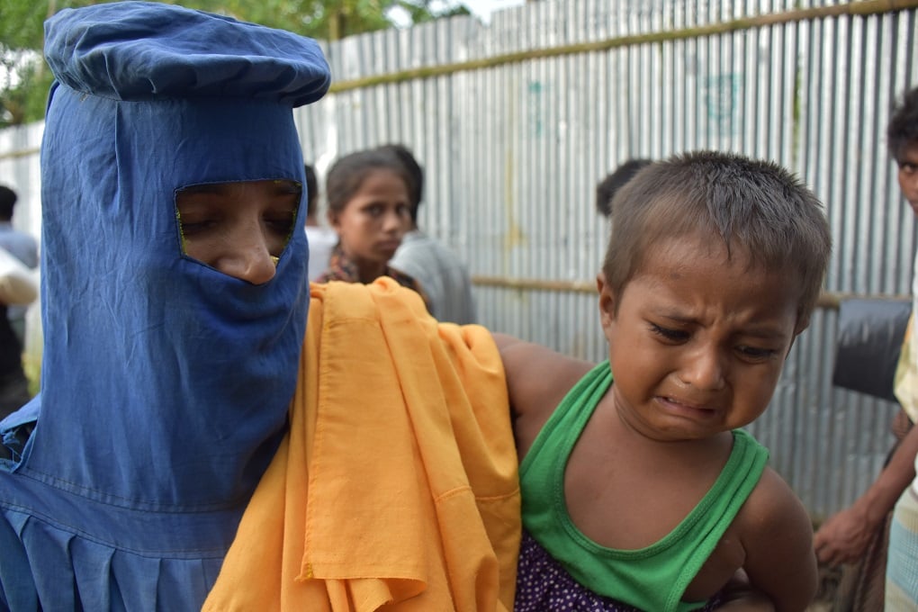 <p>The little girl was so traumatised that she thought the camera was a weapon pointed at her [image by:  Zobaidur Rahman]</p>