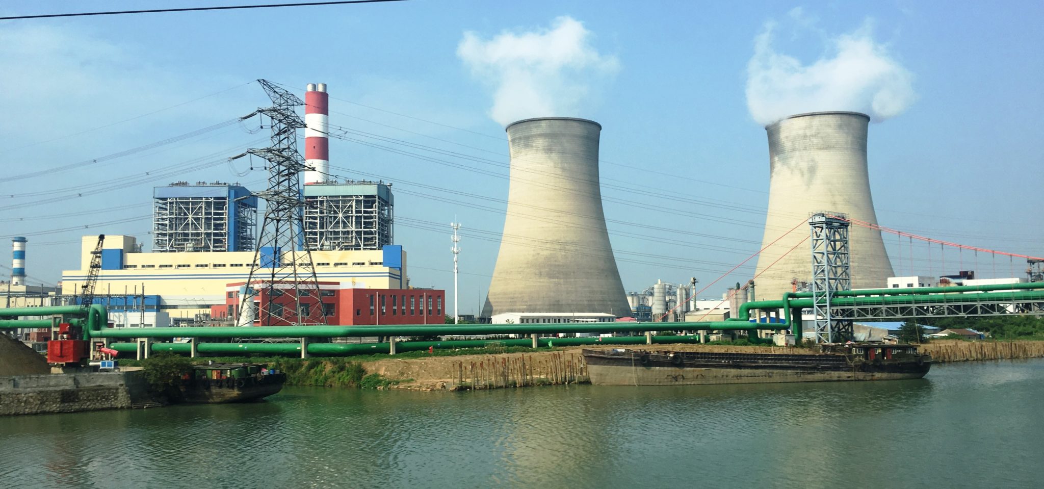 <p>(image: <a href="https://upload.wikimedia.org/wikipedia/commons/3/30/Jiangsu_Suzhou_Xiangcheng_-_Yuechengli_area_-_Wangyu_river_IMG_7172_Huadian_Wangting_CCGT_Power_Plant.jpg">wikimedia</a>)</p>