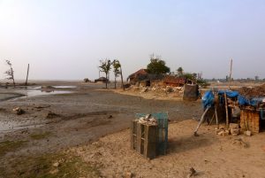 <p>About a third of the land in Dhoblat Shibpur village on Sagar Island has sunk under the sea in less than 20 years [image by: Soumya Sarkar]</p>