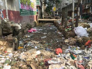 <p>Blocked by trash and plastic, Dhaka&#8217;s drains are just not capable to dealing the monsoon rains [image by: Masum Molla]</p>