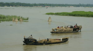 <p>Boats along the Ganga near Farakka. Image source: Sarah Jamerson</p>
