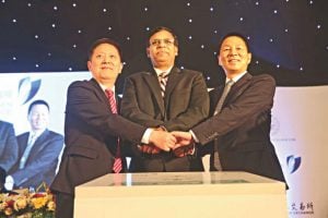 <p>Wang Jianjun, president and CEO of SZSE, and Pan Xuexian, chair of the SSE Supervisory Board, flank the Managing Director of the Dhaka Stock Exchange KAM Majedur Rahman, at the signing of an agreement on 14 May, 2018 [image courtesy: Dhaka Stock Exchange]</p>