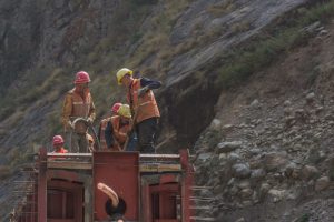 <p>Chinese workers constructing a bridge at Rasuwa Gadhi on the Nepal-China border, along the proposed railway between the two countries [image by: Nabin Baral].</p>