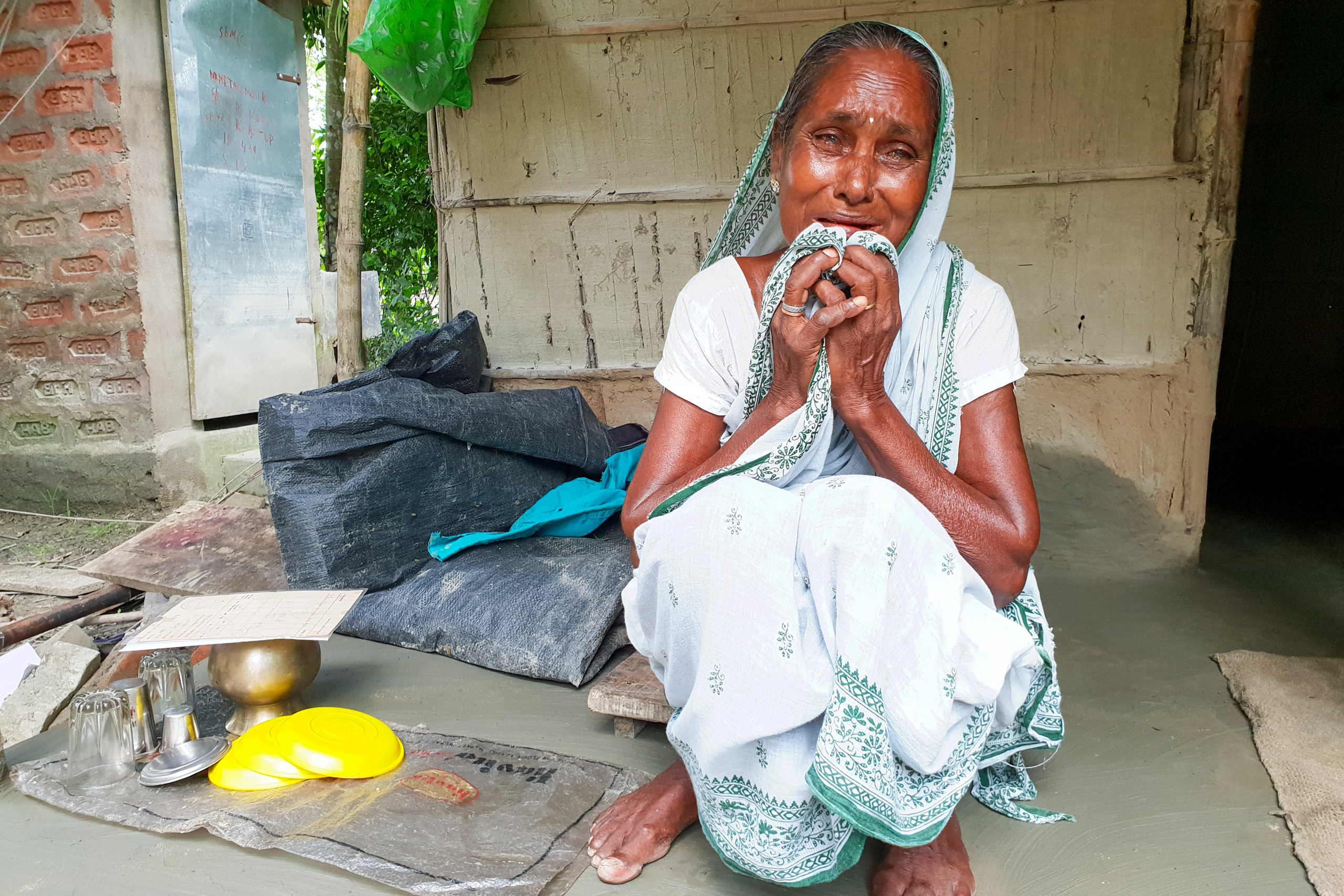 <p>Sabita Biswas reduced to tears as she worries about her grandchildren excluded from citizenship (Image: Chandrani Sinha)</p>