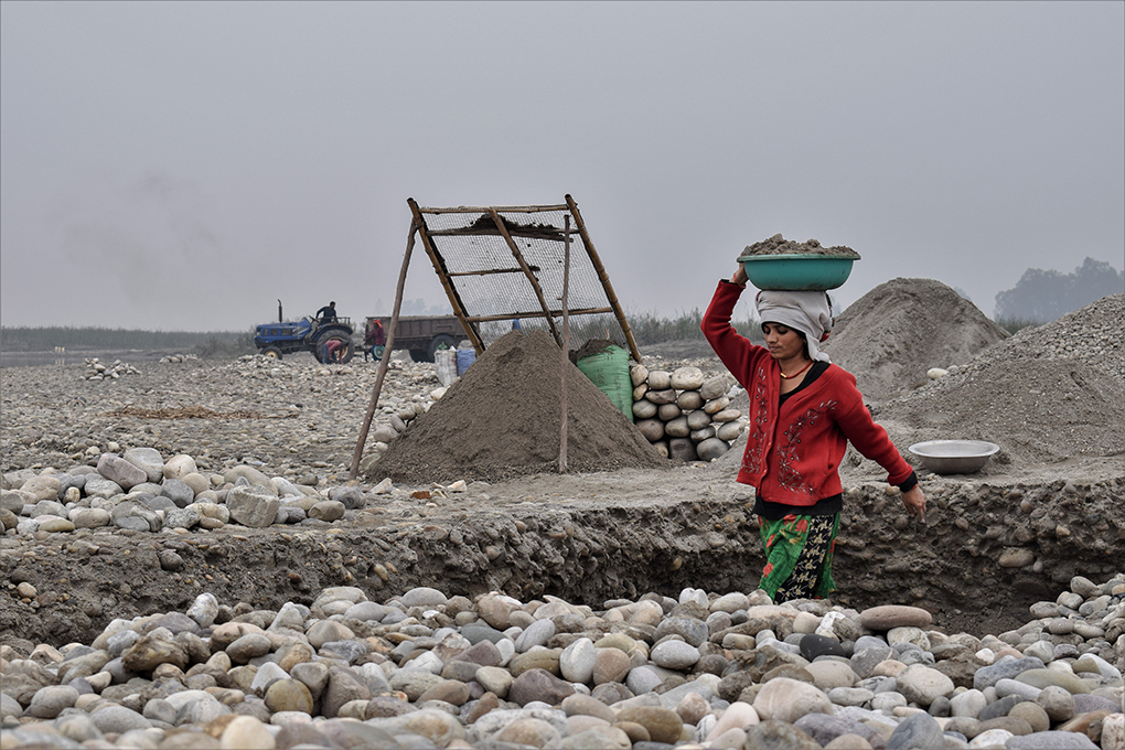 Women from Mahakali riverside villages work as daily wage labourers, quarrying stones and sieving sand from the riverbed