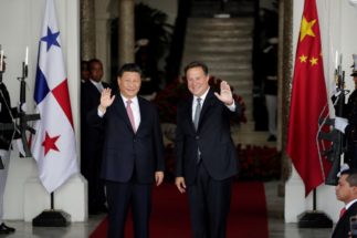 China's President Xi Jinping greets Panama's President Juan Carlos Varela before a meeting at the Presidential Palace in Panama City, Panama
