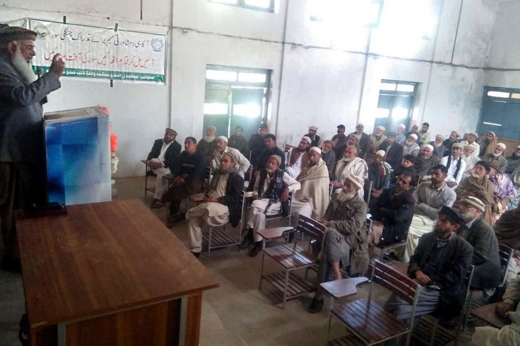 A meeting held on February 2020 at a school in Darband Manshera district to inform farmers regarding wild boar control [image by: Adeel Saeed]