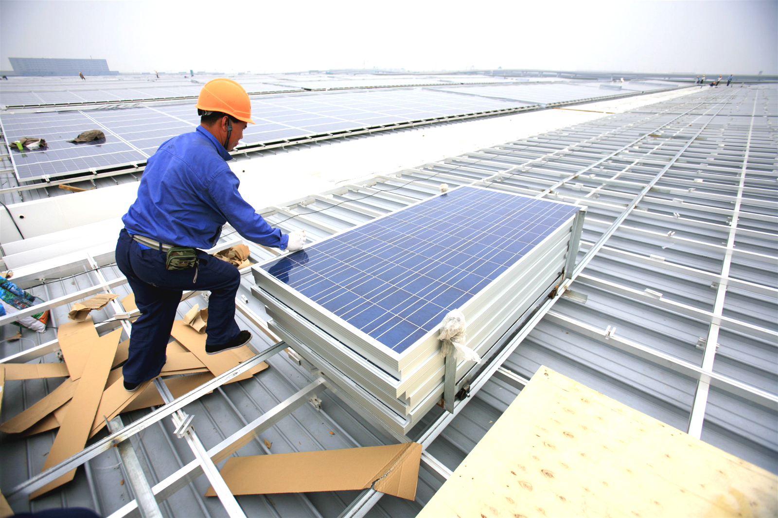 <p>Solar roof installation in Shanghai, China. (Image: Jiri Rezac)</p>