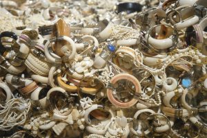 <p>A collection of ivory jewellery. Legal ivory carvers in China use tusks imported during one-off, sanctioned sales from Africa. (Image by Gavin Shire / USFWS)</p>