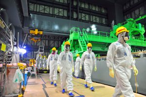 <p>IAEA experts visiting Tepco&#39;s stricken&nbsp;Fukushima Daiichi Nuclear plant in&nbsp;2013&nbsp;(Image by </p>