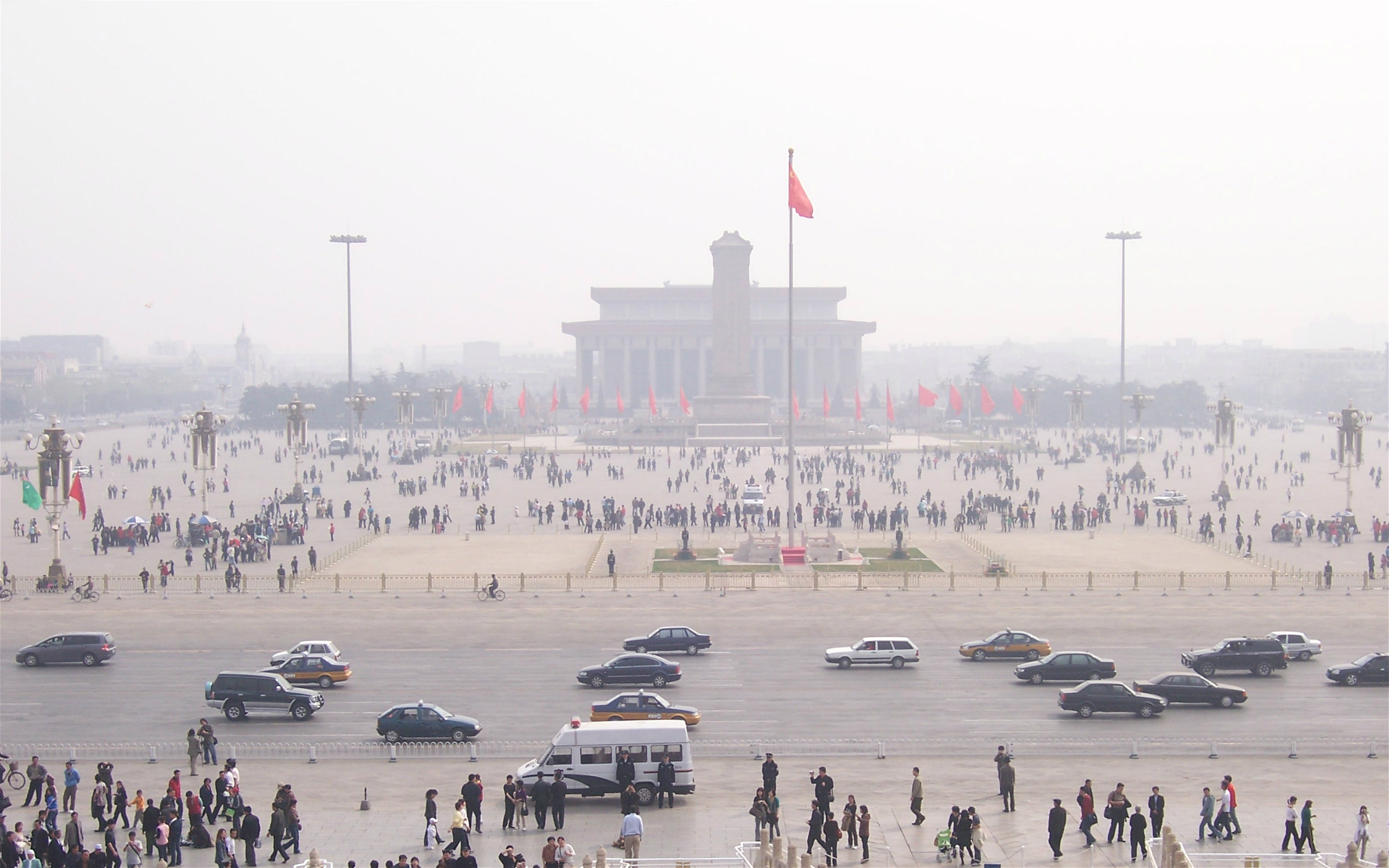 <p>Beijing&#8217;s Tiananmen Square under smog. The new ministry will regulate both air pollution and CO2 (Photo: McKay Savage)</p>