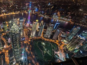 a sprawling night time view of Shanghai