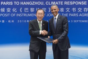 <p>Ban Ki-moon receives the legal instruments for joining the Paris Agreement from Barack Obama at the 2016 G20 summit in Hangzhou, China. (Image by&nbsp;UN Photo/Eskinder Debebe)</p>