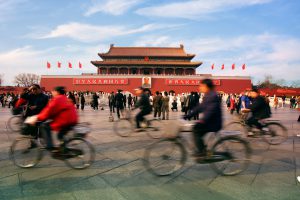China and the environment: citizens cycle beneath blue skies over Beijing (Image: Alamy) 