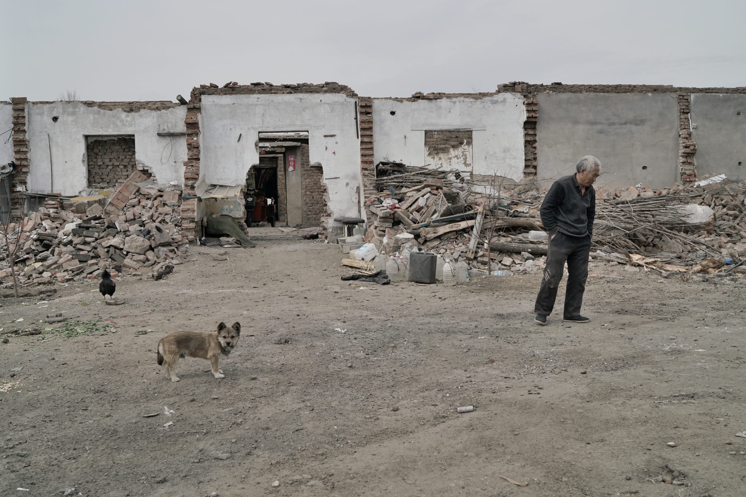 <p>In the old mining villages near the pits of Fuxin you can still find former miners like Huang Anyuan (above), who worked in coal mines for 30 years (Image: Stam Lee)</p>