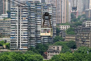 <p>Apartment blocks in Chongqing. China&#8217;s housing stock will need to be upgraded on a huge scale to make big carbon savings from the sector. Pic: Clément Belleudy</p>