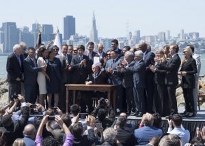 <p>Governor Jerry Brown signs an&nbsp;extension of California&#39;s cap and&nbsp;trade scheme, setting an example for other leaders with ambitious&nbsp;climate goals. (Image: California State Senate)</p>