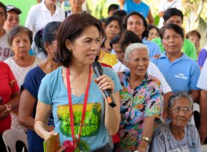 <p>Regina Lopez, the Philippine secretary of the environment, addresses residents of Marinduque about steps she is taking to tame unlawful mining practices (Image: Keith Schneider)</p>