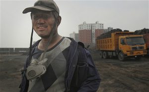 Worker at the Mengfa Energy Group coal cleaning plant, Ordos, Inner Mongolia.(Image by Qiu Bo / Greenpeace)