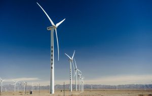 Wind farms in Xinjiang province. The 14th energy five year plan will likely set a more realistic target for wind and solar capacity (Image: Alamy)