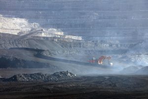 <p>A open-pit mine in China (Image: Alamy)</p>