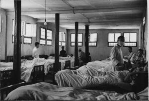 black and white photograph of patients in a ward in Lanzhou, China, 1945