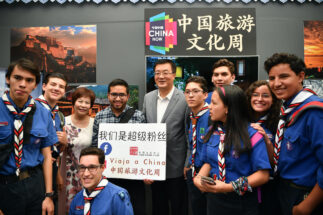 Chinese Ambassador to Mexico Zhu Qingqiao poses for group photos with Facebook followers of China's Cultural Center in Mexico