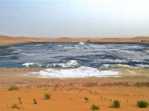 Waste water pits hidden among the dunes in Tengger Desert (Image: Chen Jie / New Beijing)