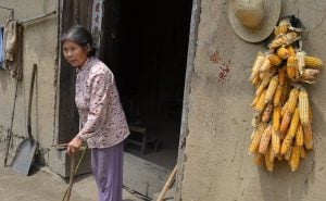 <p>People are being moved from villages where older houses are at serious risk from landslides and floods (Image copyright: Andrew Stokols)</p>