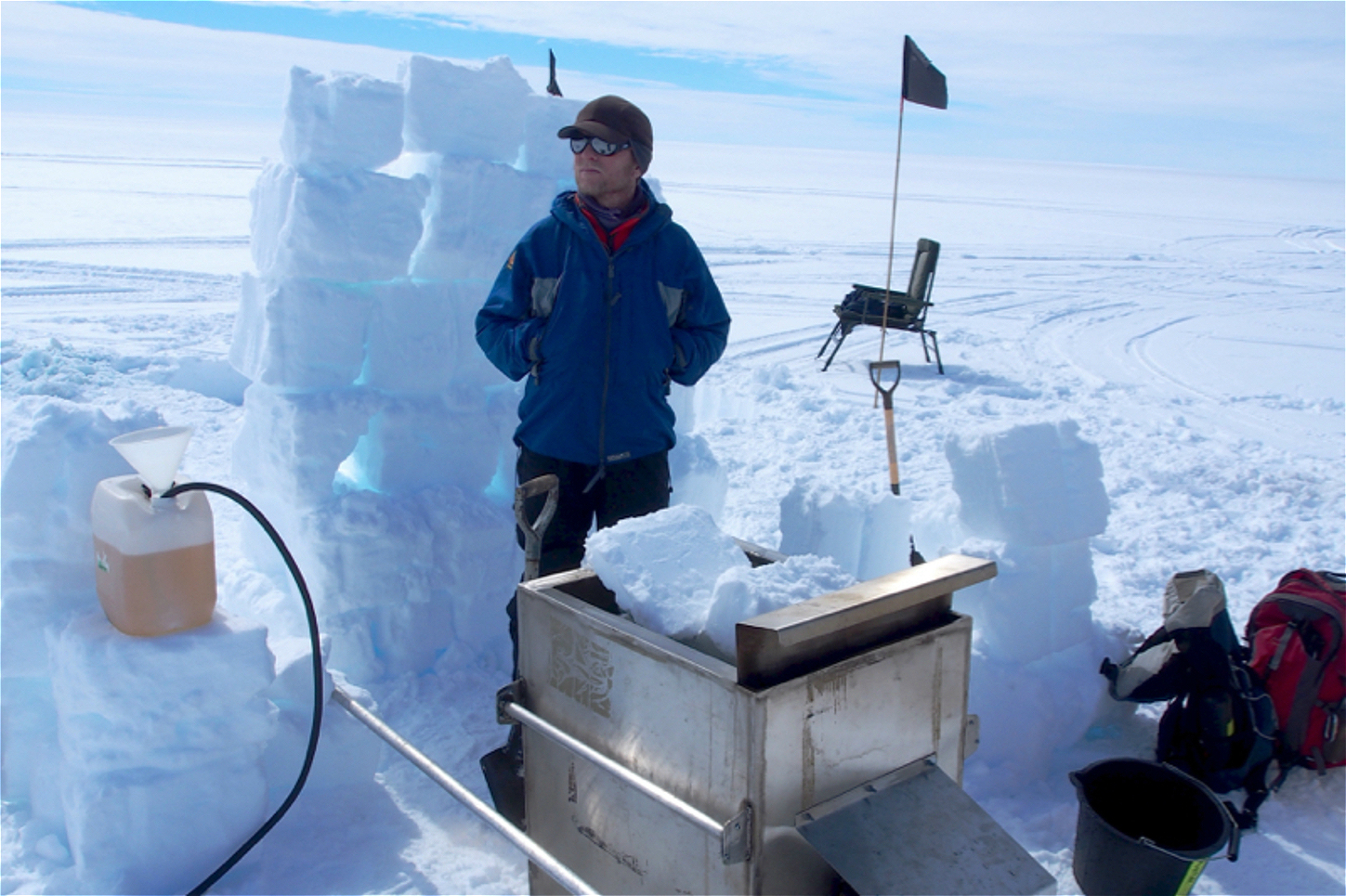 <p>The author prepares to assist his colleague, Bryn Hubbard from Aberystwyth University, in drilling a borehole in Larsen C using pressurised hot water. (Image: MIDAS, Author provided)</p>