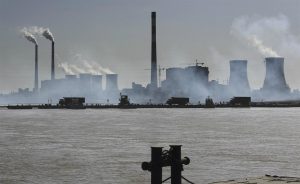 <p>Rampant expansion of coal industrial projects caused damage to the Yellow River. (Image: Lu Guang/Greenpeace)</p>