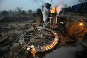 A small scale steelworks in China powered by burning coal.