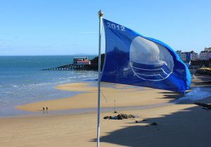 A beach in Tenby, western Wales, displays an EU-awarded Blue Flag denoting water quality