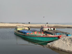 <p>Bangladeshi barges loaded with stone chips at Dhubri, a port of call along the Kolkata-Silghat protocol route</p>