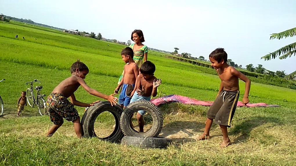 Char children playing in the library campus [image by: Abdul Kalam Azad]