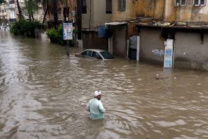 <p>A flooded Karachi neighbourhood on August 27, 2020 [Image by: Alamy]</p>